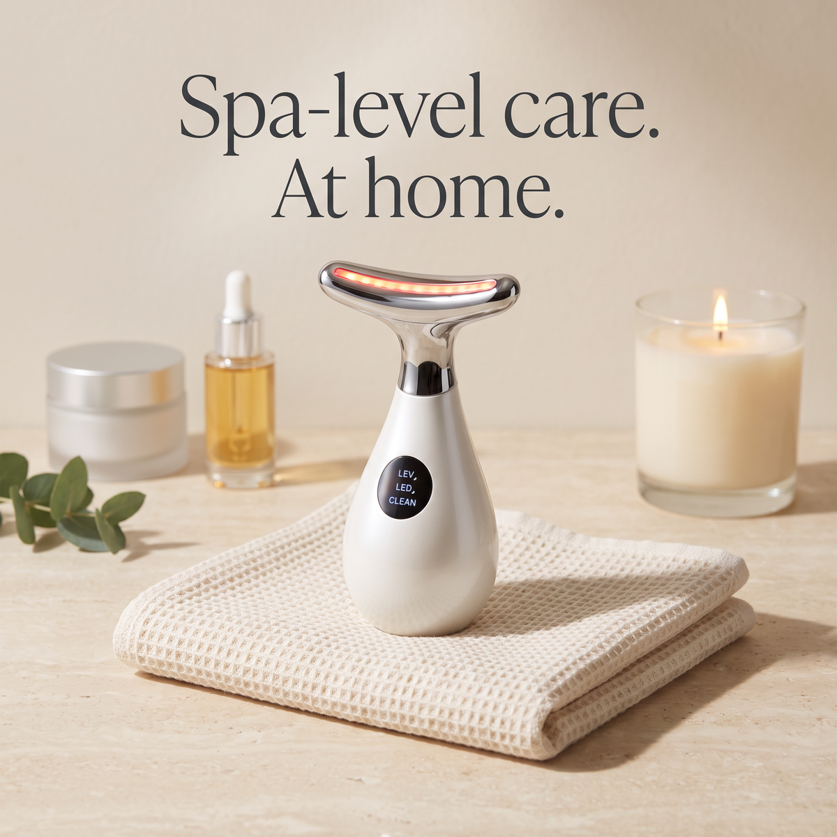 Korvella Sculpt Wand on a spa-style vanity with skincare